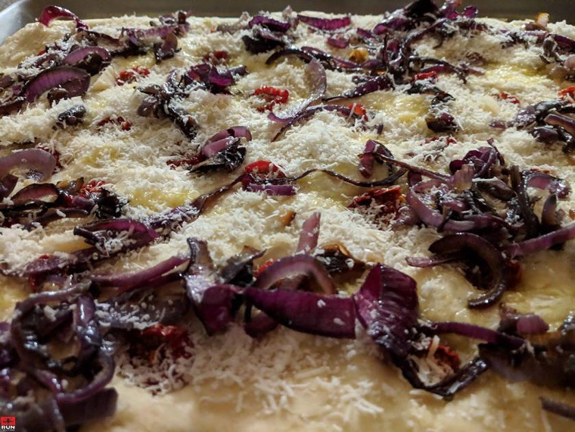 Focaccia Bread - cherry tomatoes, caramelized onions, parmesan cheese toppings